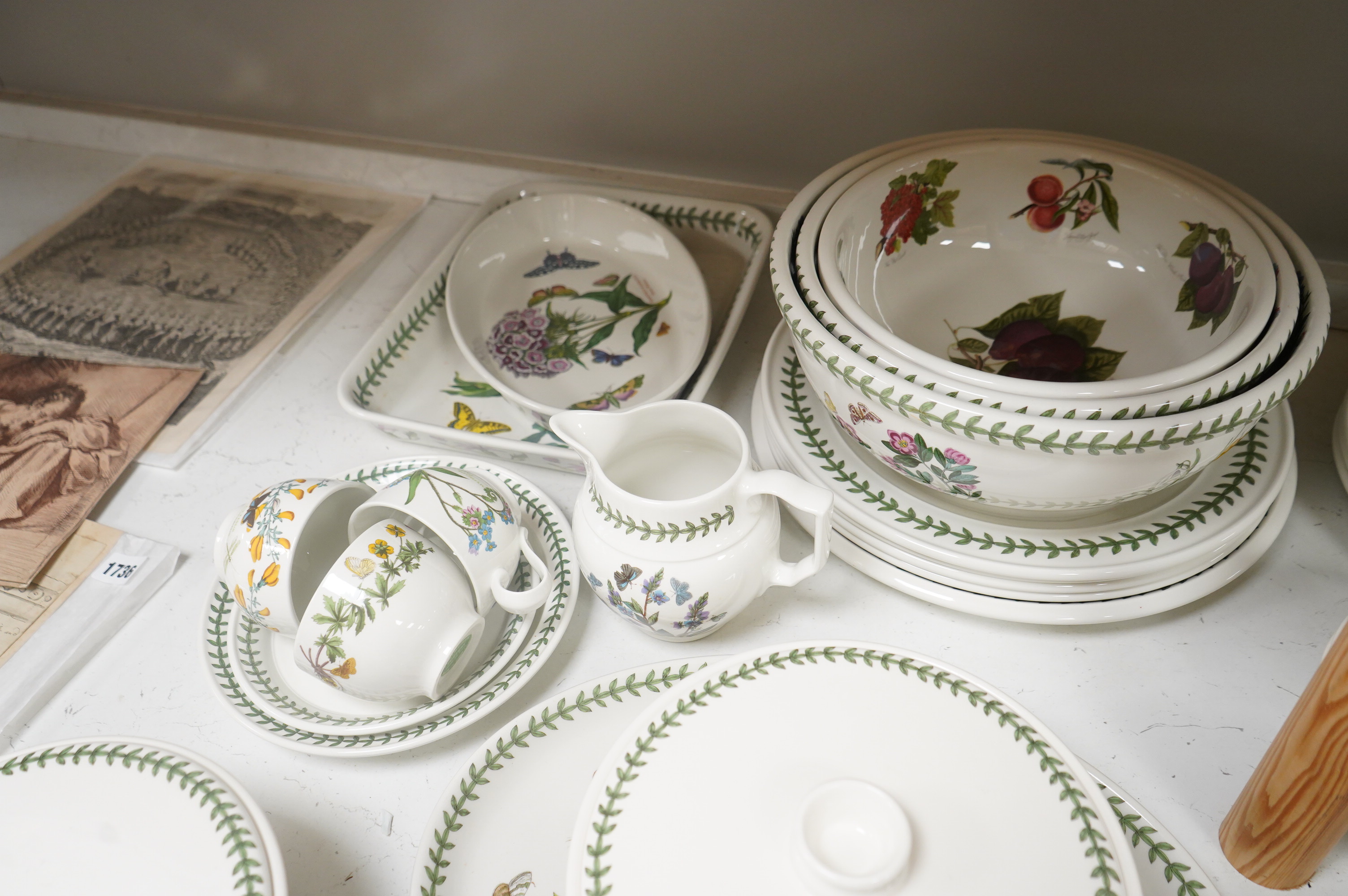 A large quantity of Portmerion Botanic Garden dinner and tea wares to include graduated bowls, dinner plates and side plates